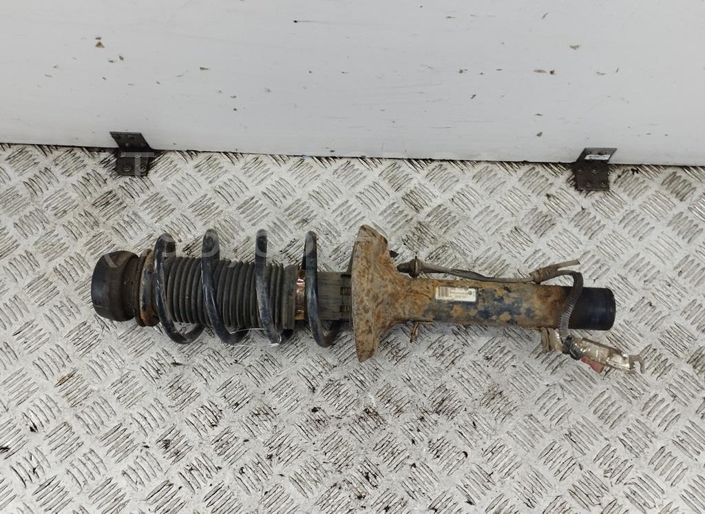 Амортизатор передний левый