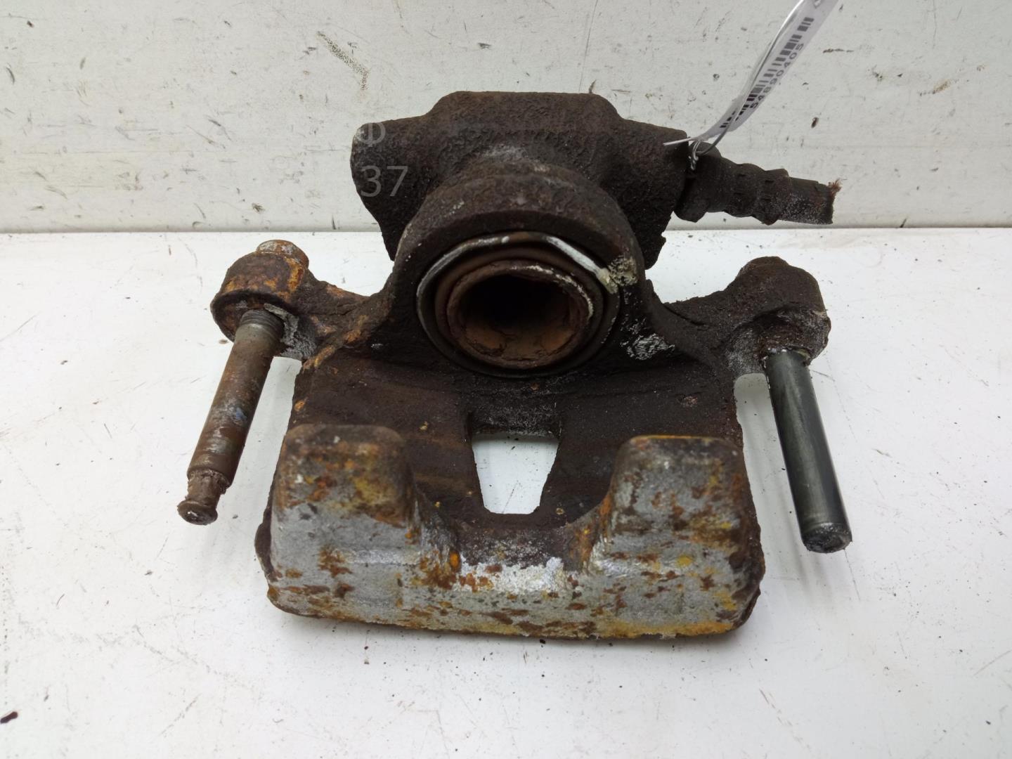 Суппорт задний левый