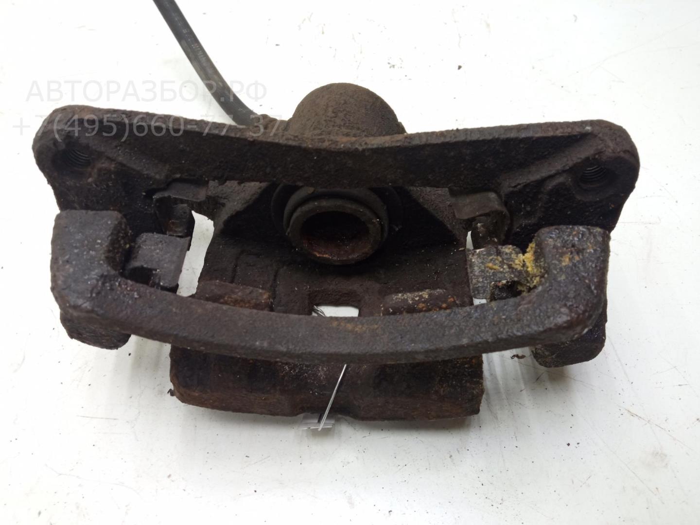 Суппорт задний левый