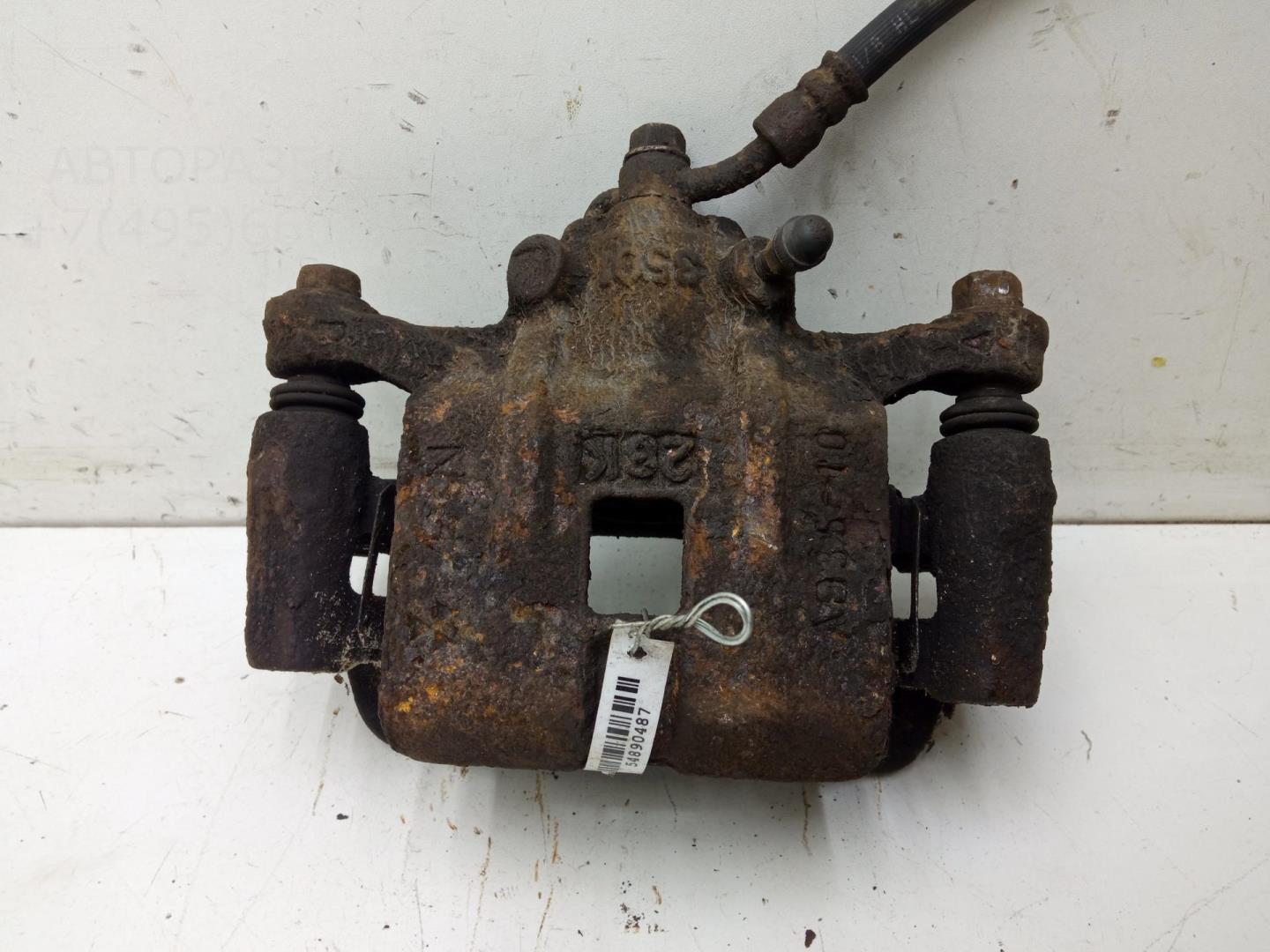 Суппорт задний левый