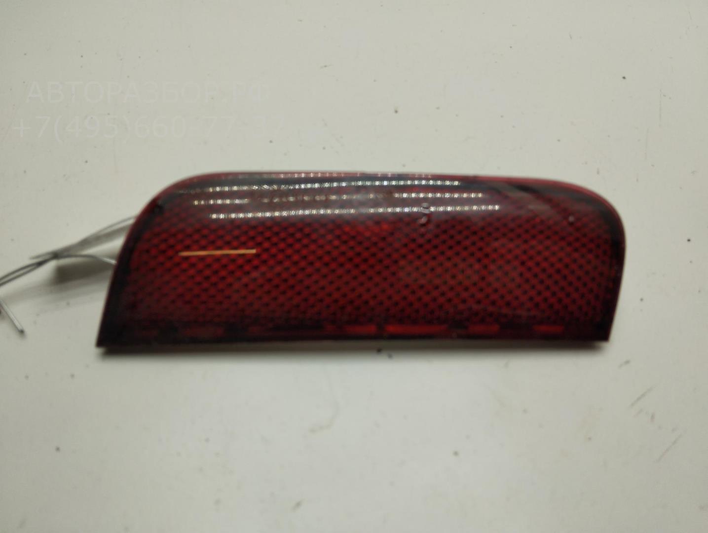 Отражатель в бампер задний левый