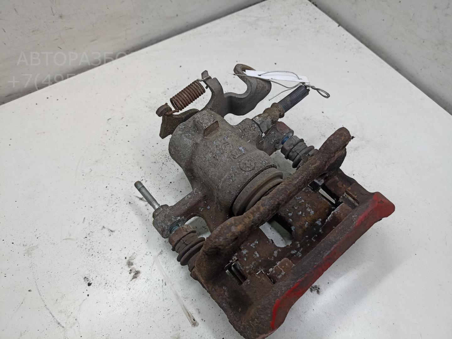 Суппорт задний левый