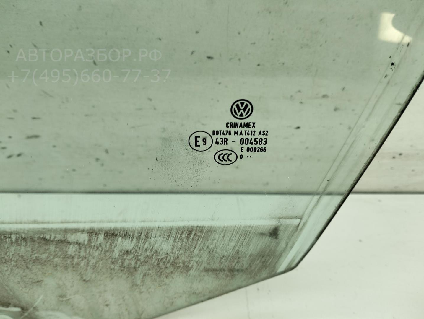 Стекло двери передней левой