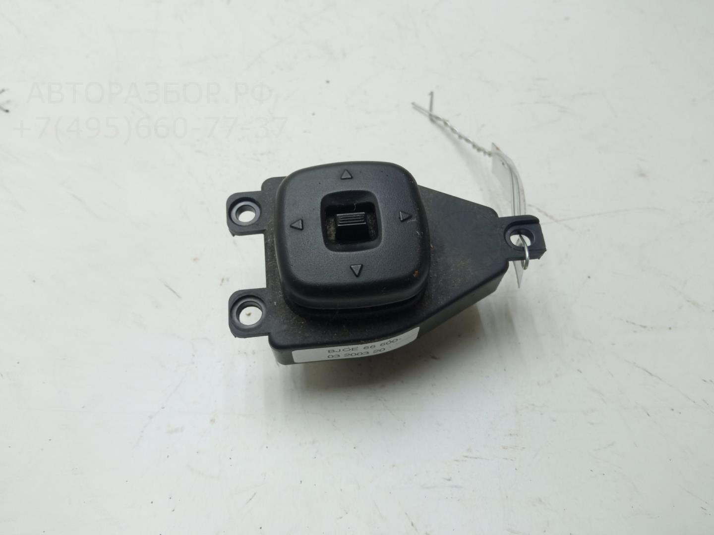 Кнопка регулировки зеркала