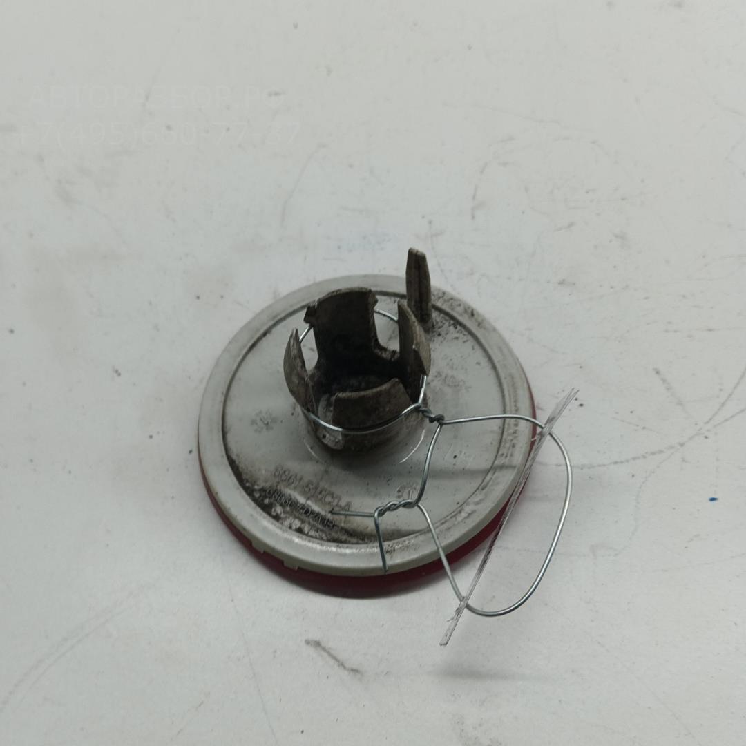 Отражатель в бампер задний левый