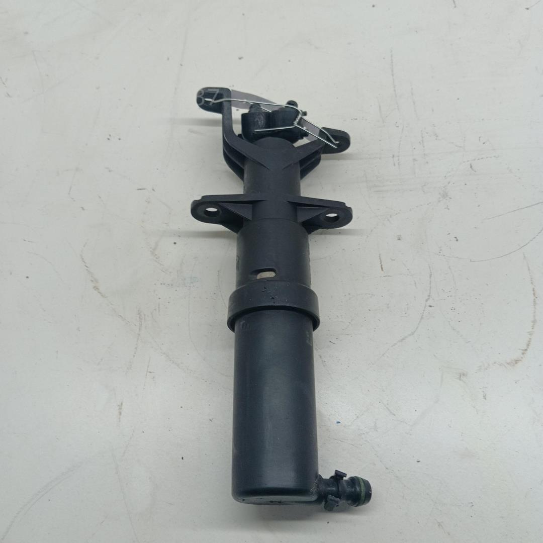 Форсунка омывателя фары