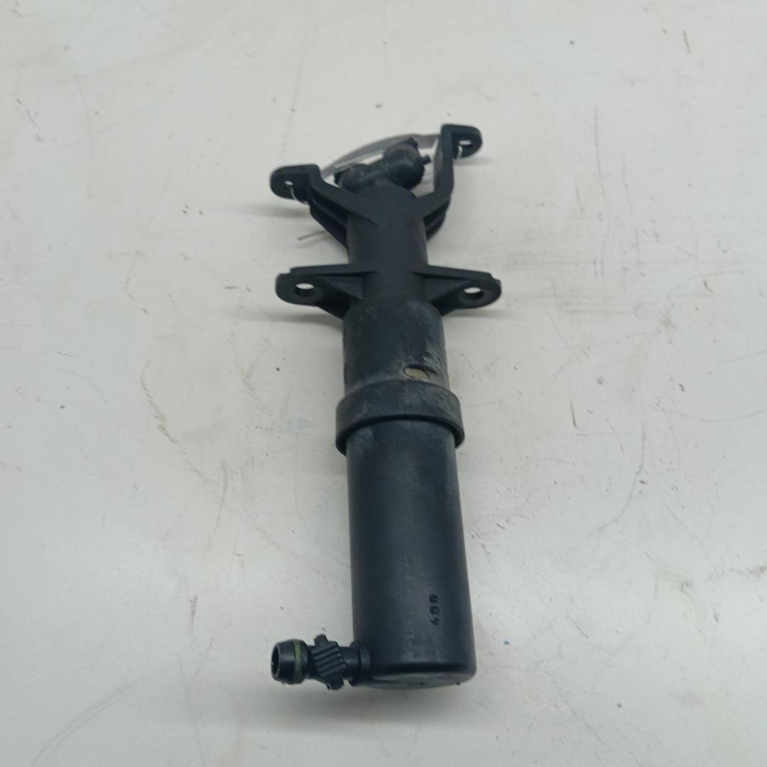 Форсунка омывателя фары