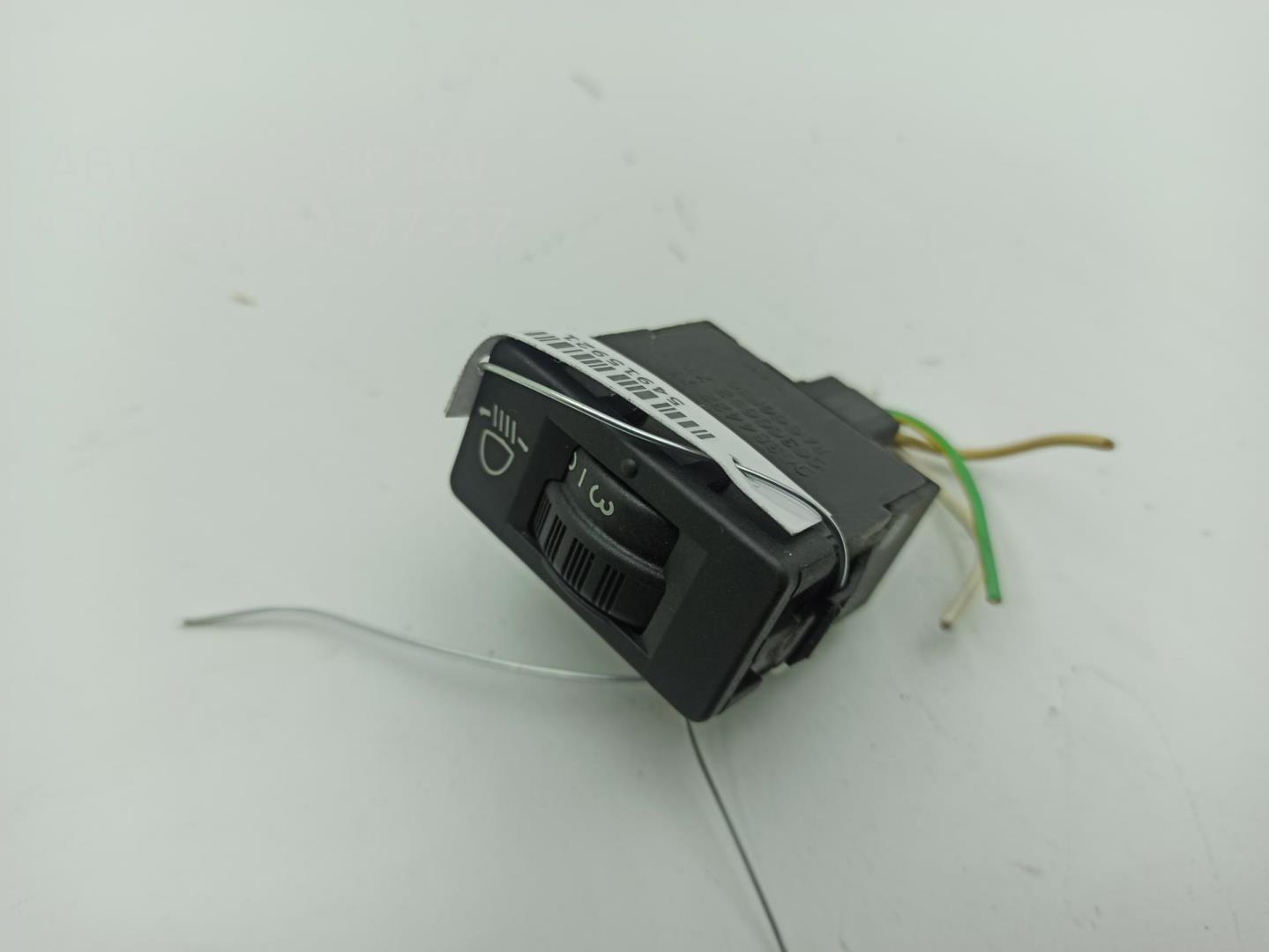 Кнопка корректора фар