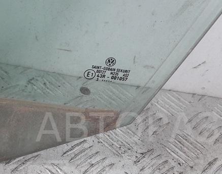 Стекло двери передней левой