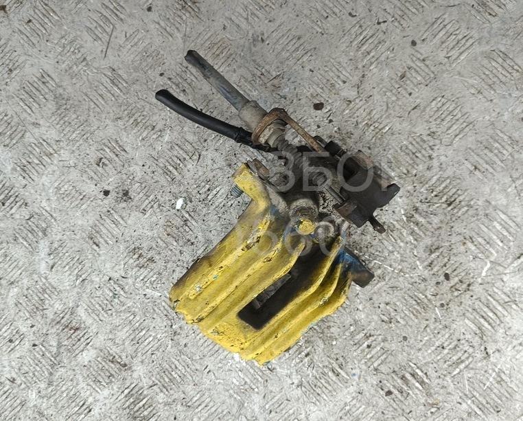 Суппорт задний левый