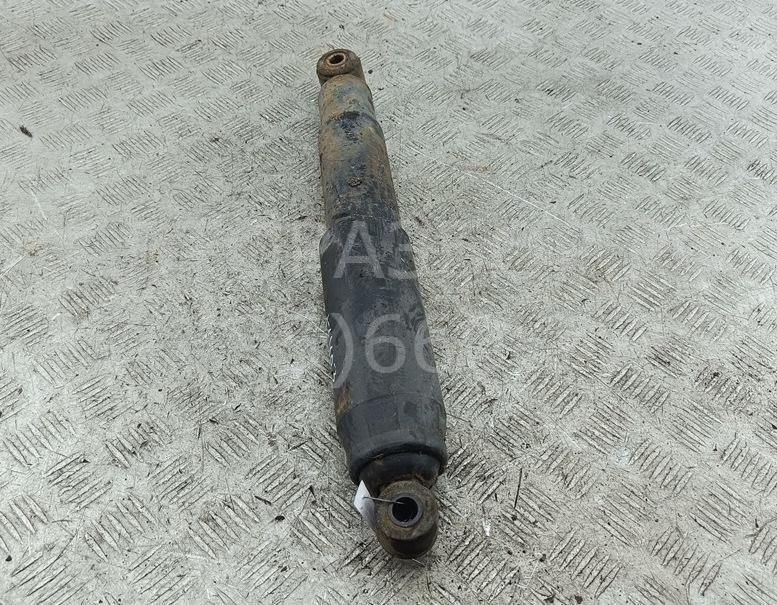 Амортизатор задний левый