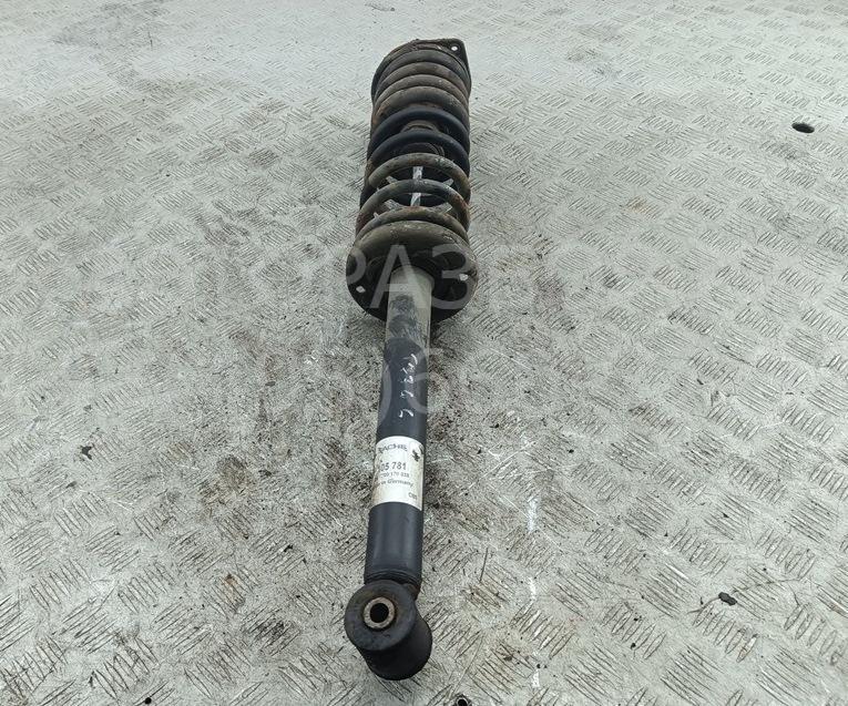 Амортизатор задний левый