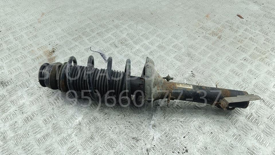 Амортизатор передний левый