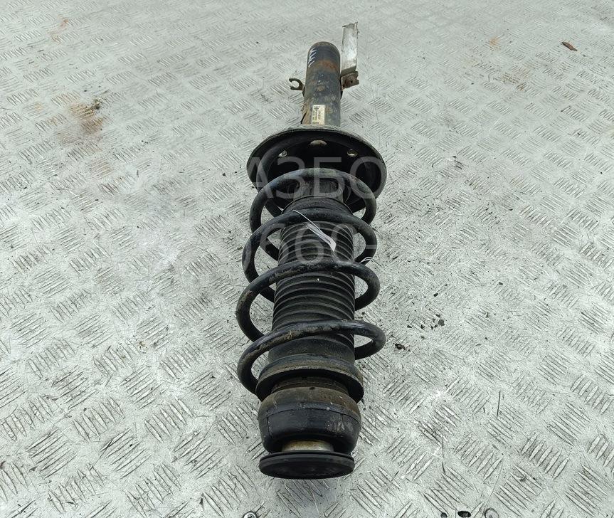 Амортизатор передний левый