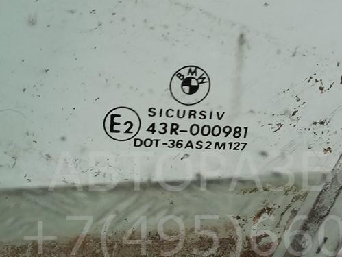 Стекло двери передней левой