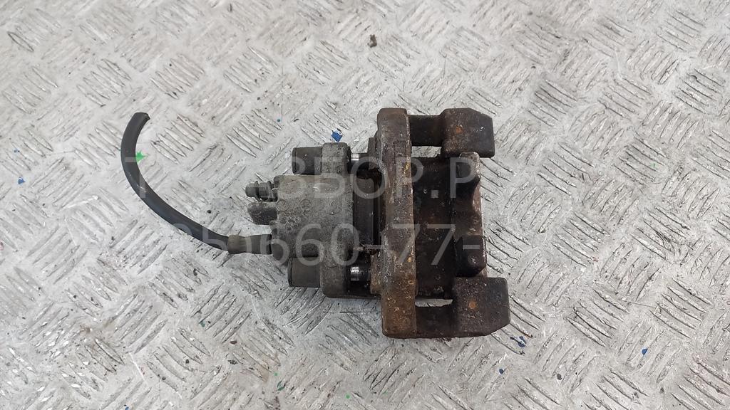 Суппорт задний левый