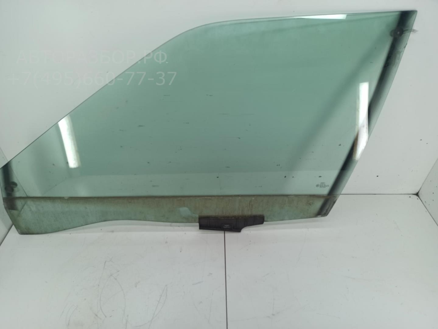 Стекло двери передней левой