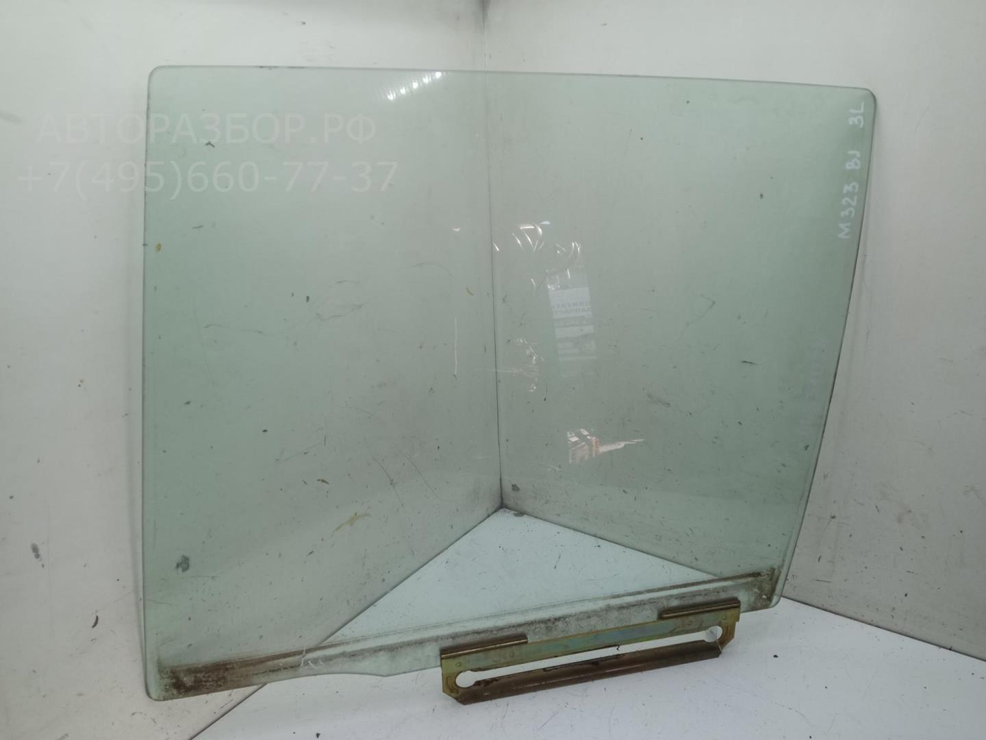 Стекло двери задней левой