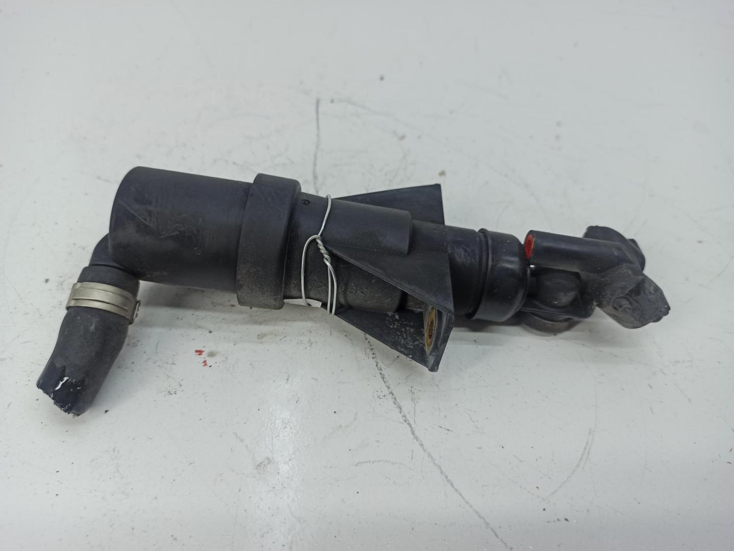 Форсунка омывателя фары