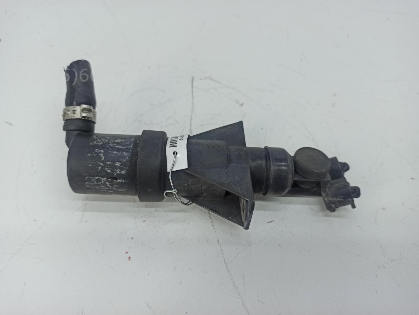 Форсунка омывателя фары