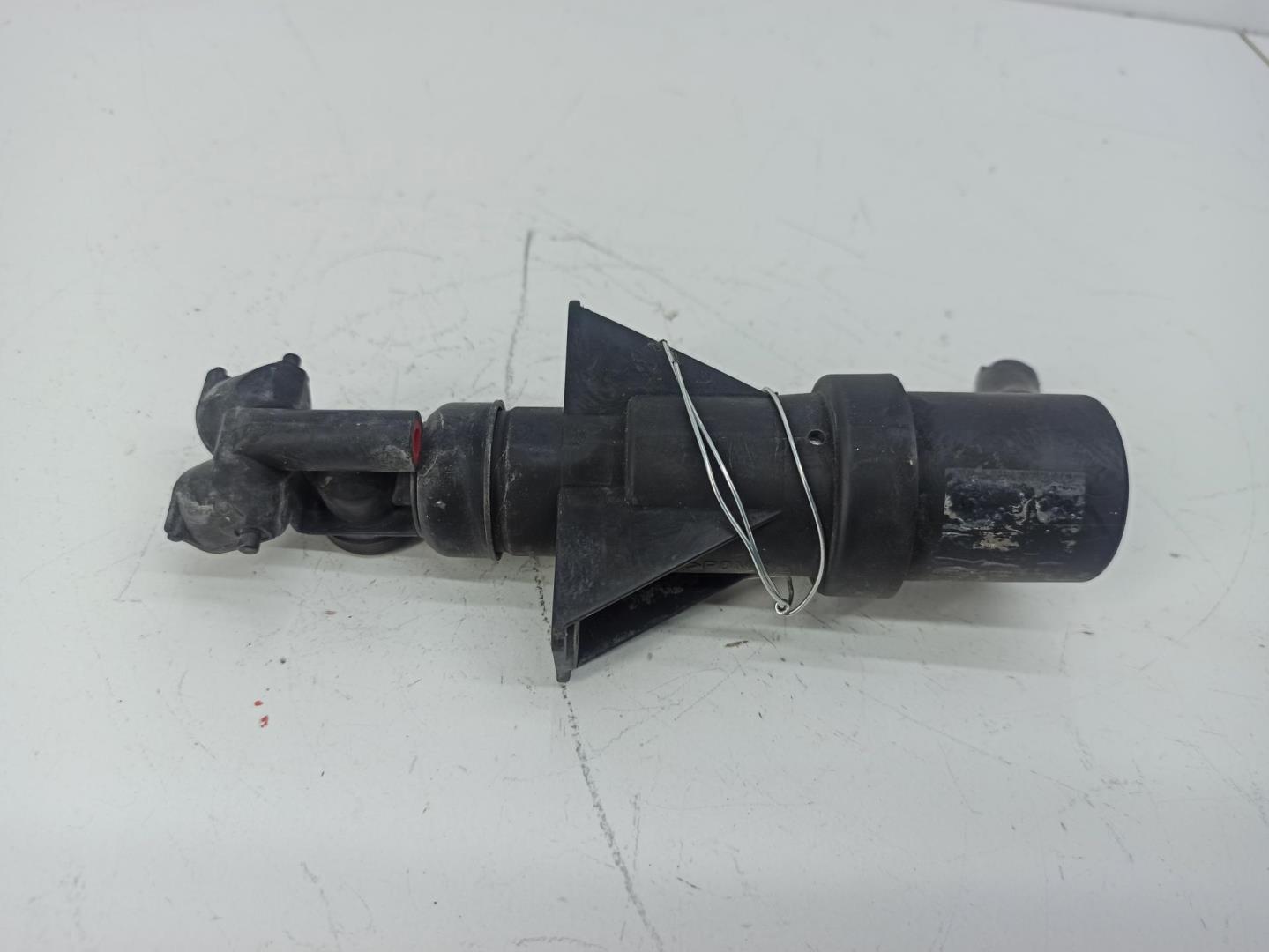 Форсунка омывателя фары