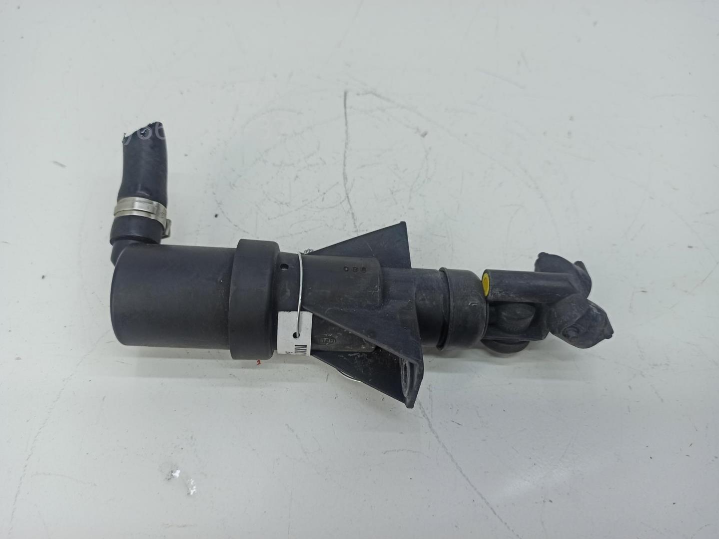 Форсунка омывателя фары