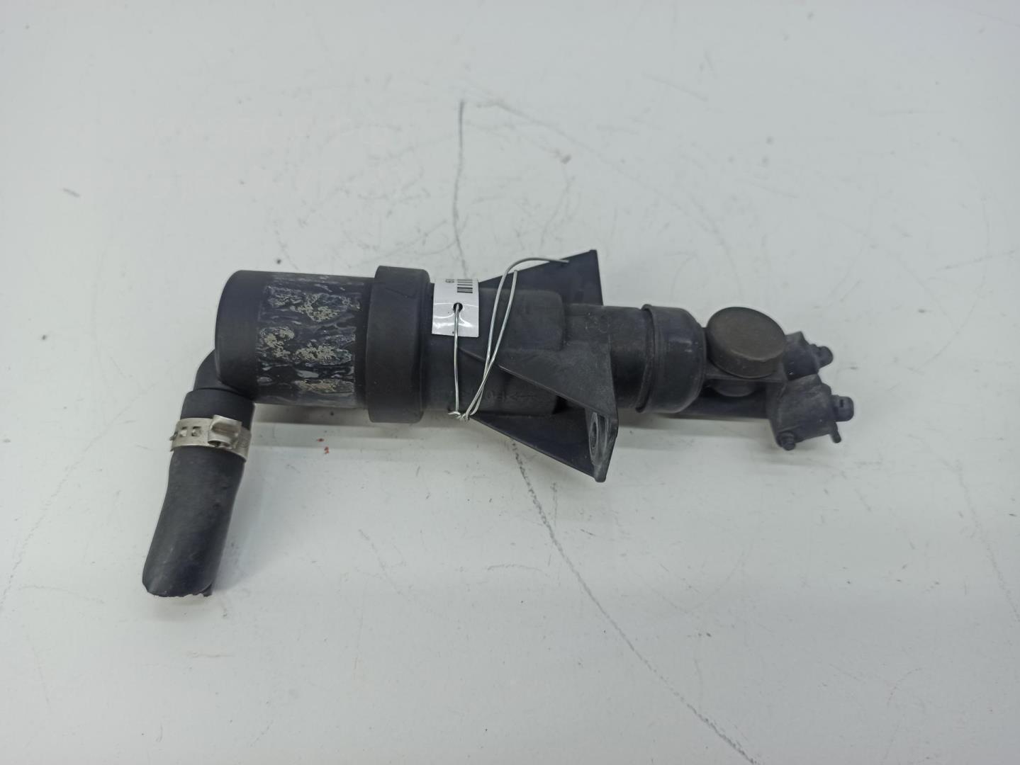 Форсунка омывателя фары