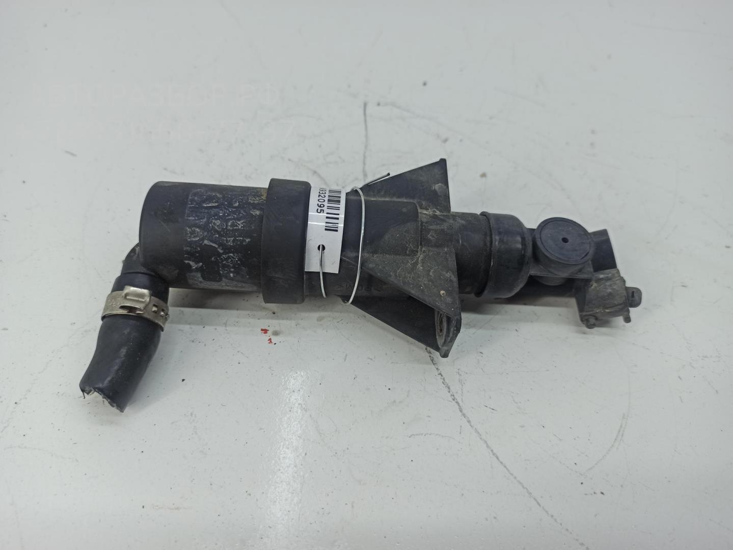 Форсунка омывателя фары