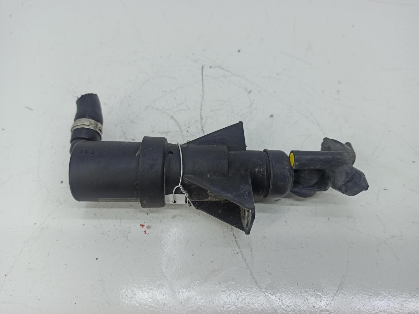 Форсунка омывателя фары