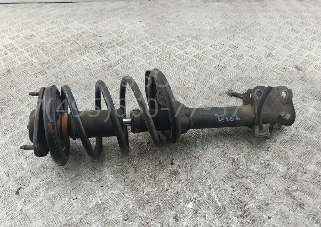 Амортизатор передний левый