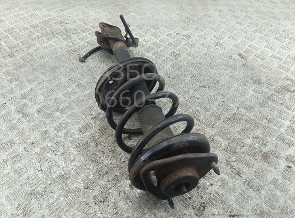 Амортизатор передний левый