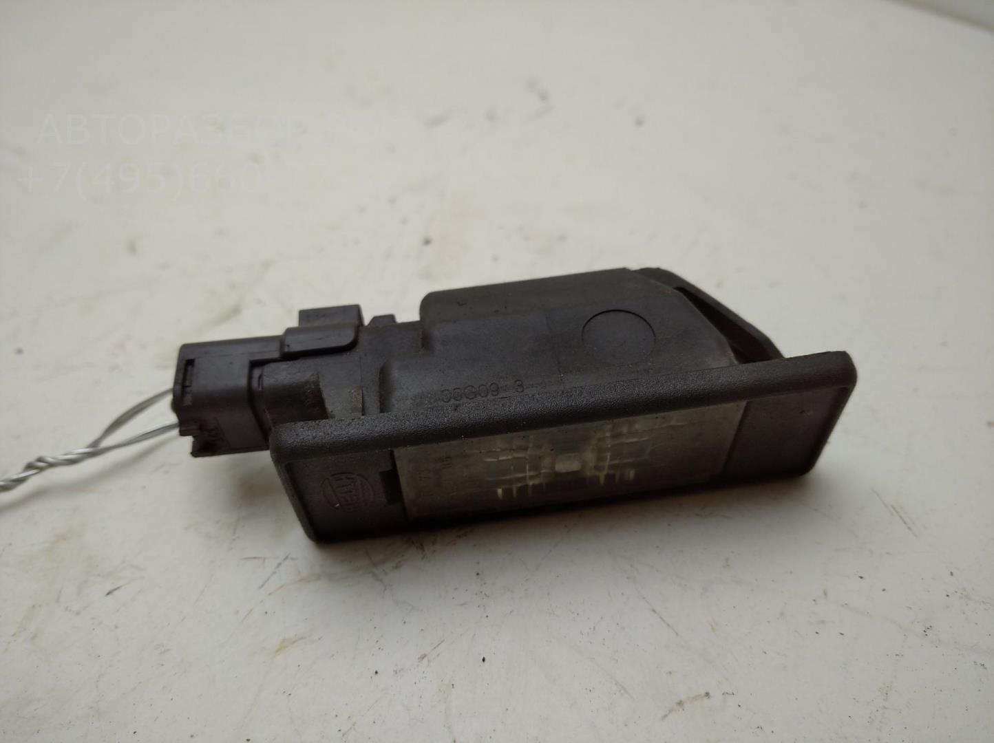 Фонарь подсветки номера