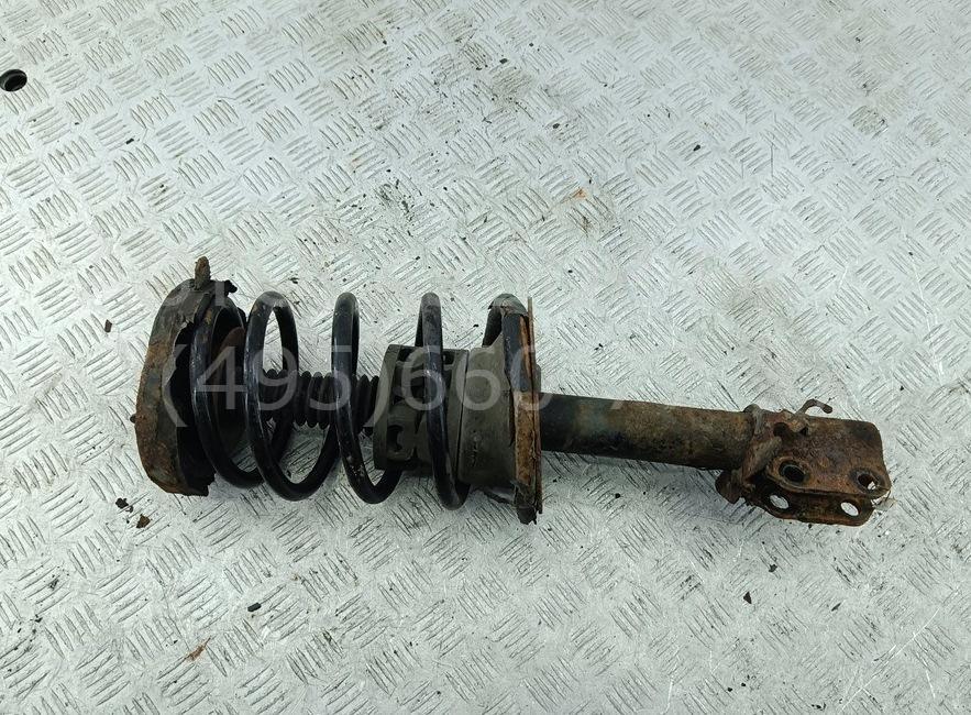 Амортизатор передний левый