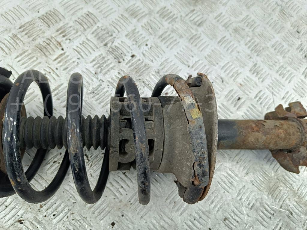 Амортизатор передний левый