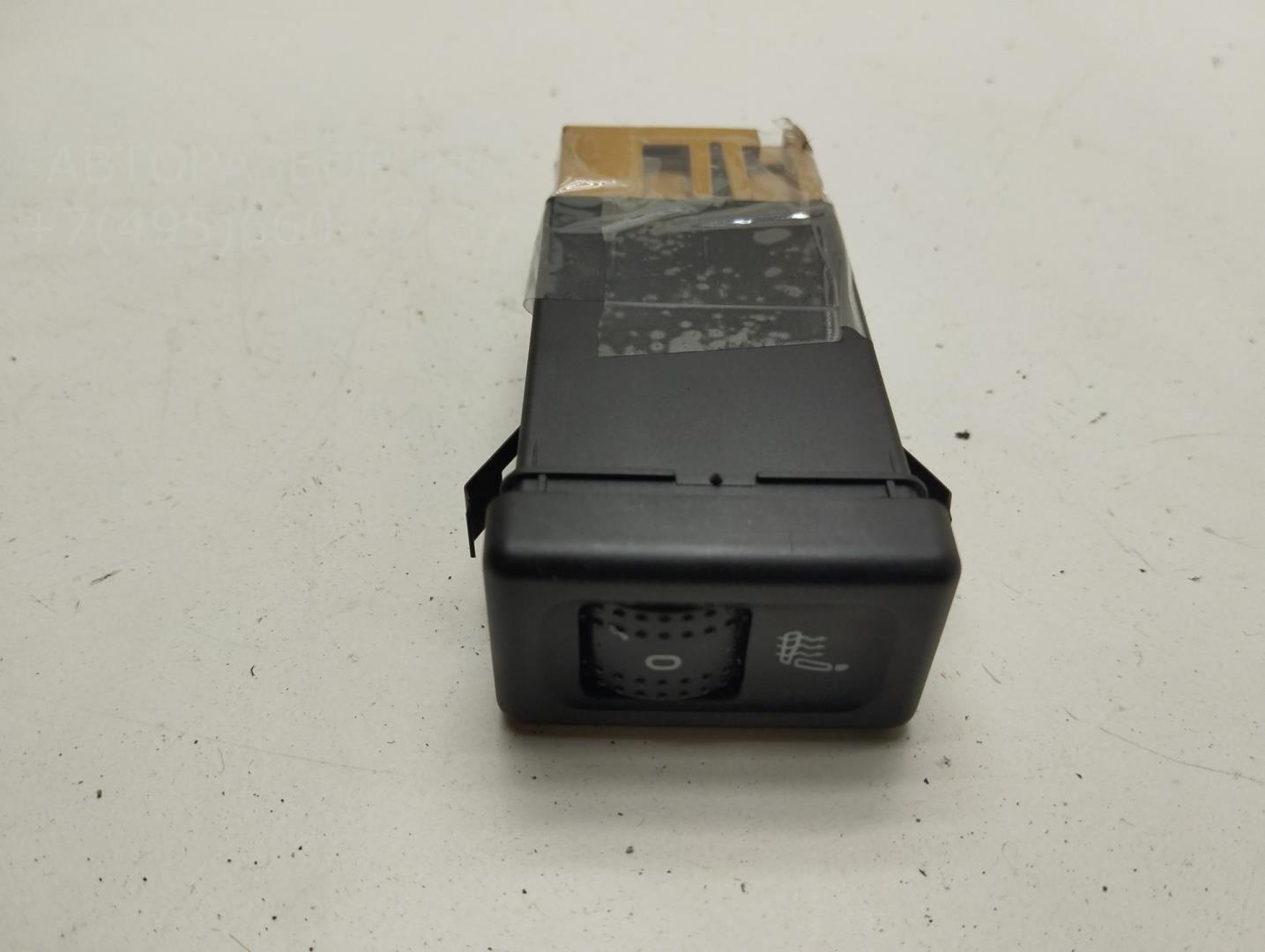 Кнопка обогрева сидений