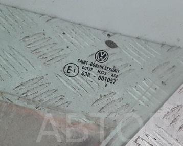 Стекло двери передней левой