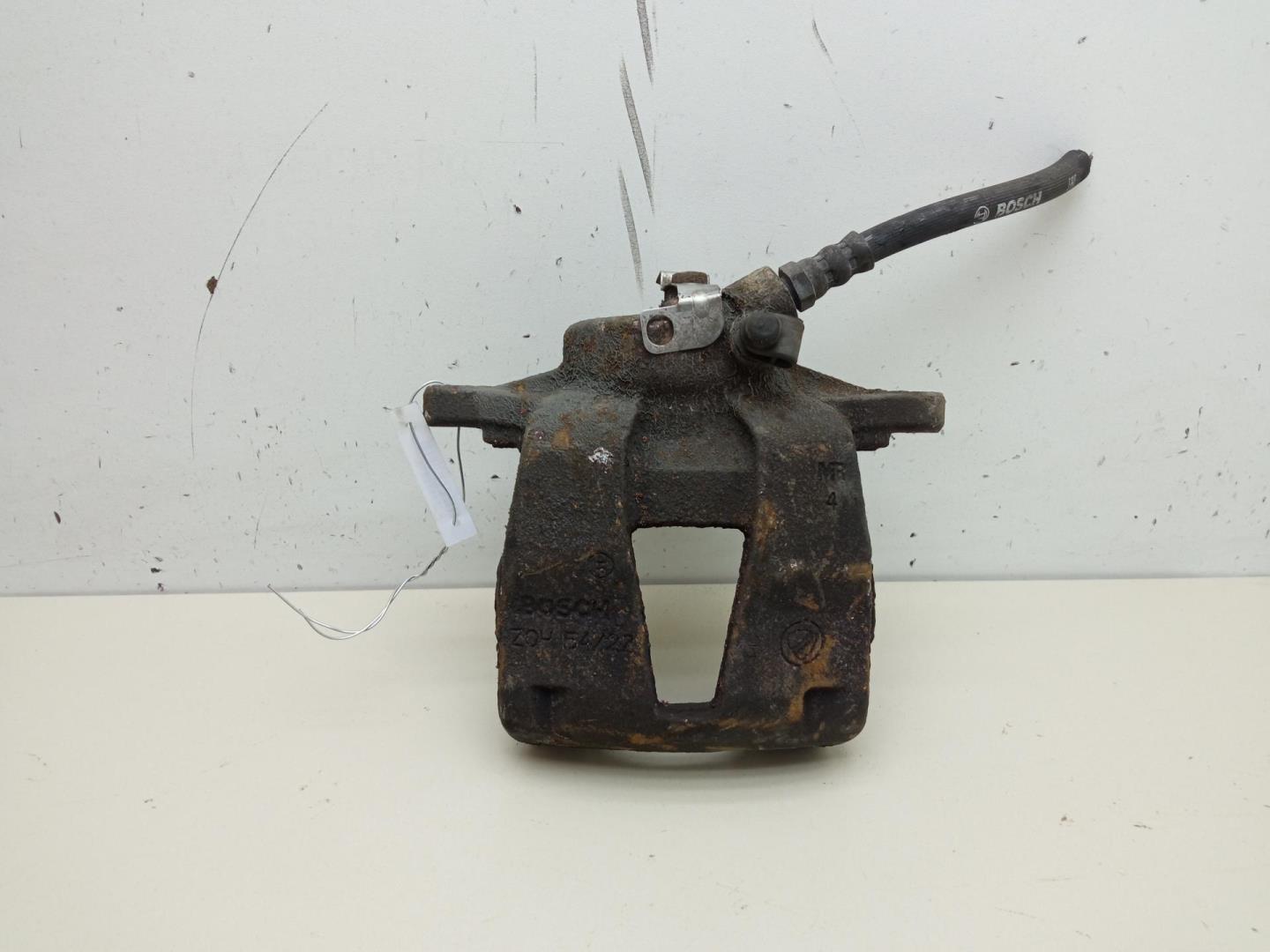 Суппорт передний левый