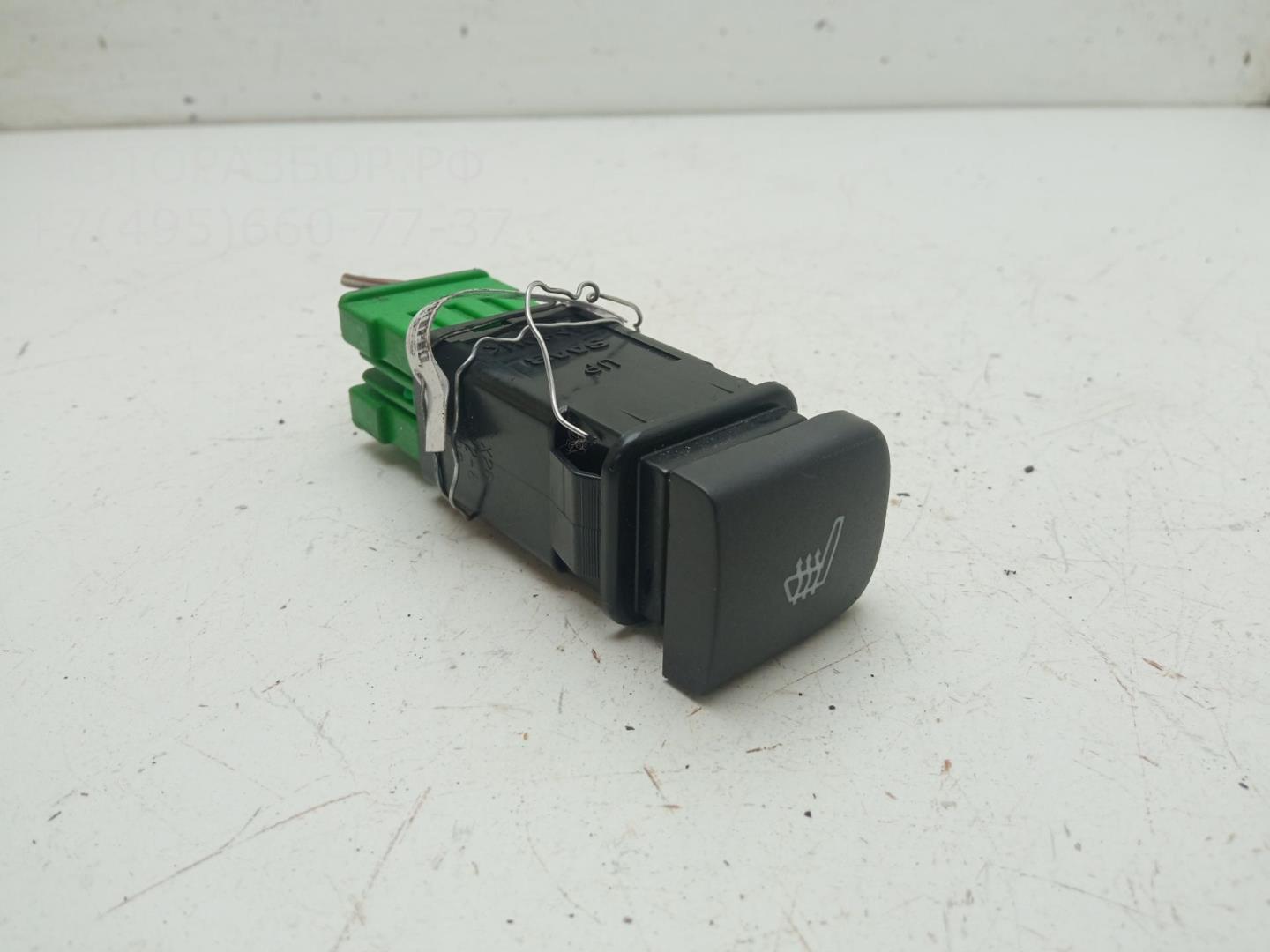 Кнопка обогрева сидений