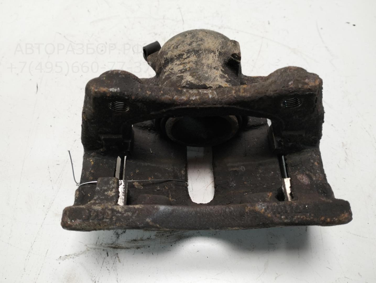 Суппорт передний левый