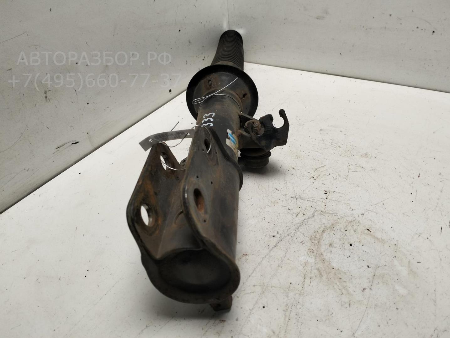 Амортизатор передний левый