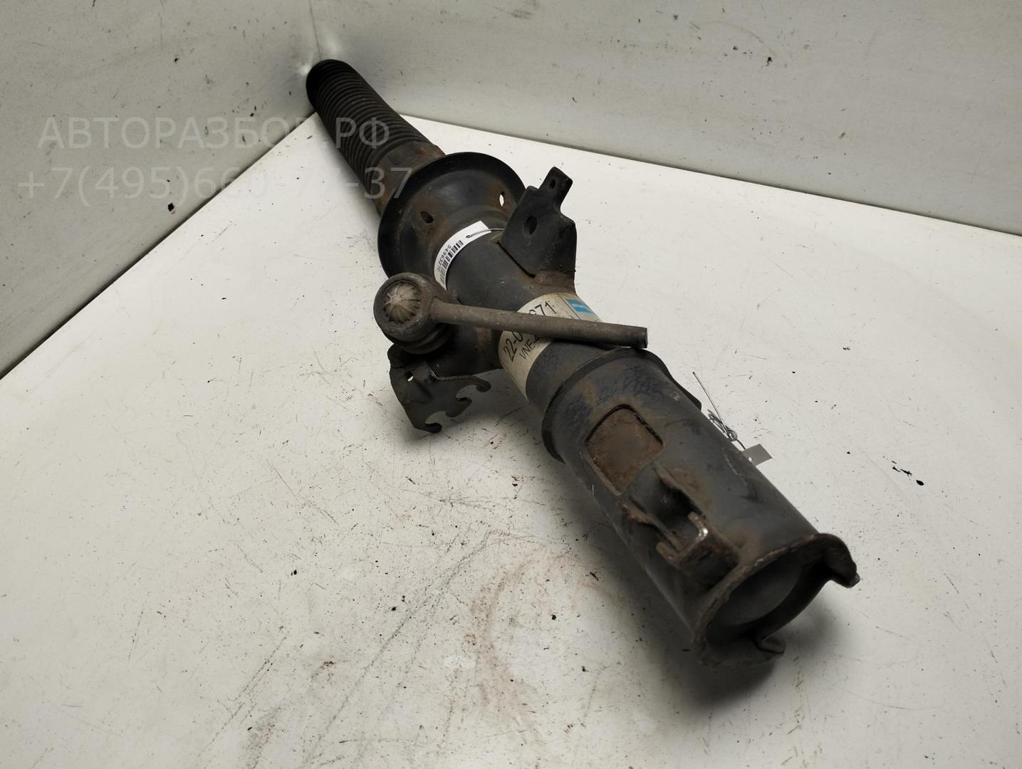 Амортизатор передний левый