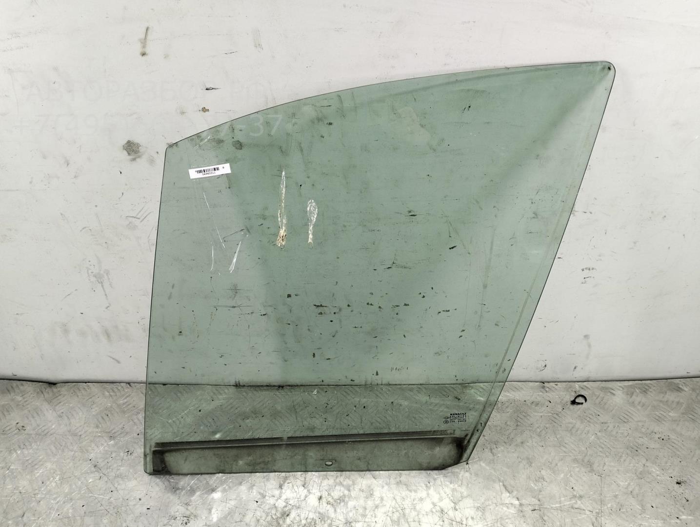 Стекло двери передней левой