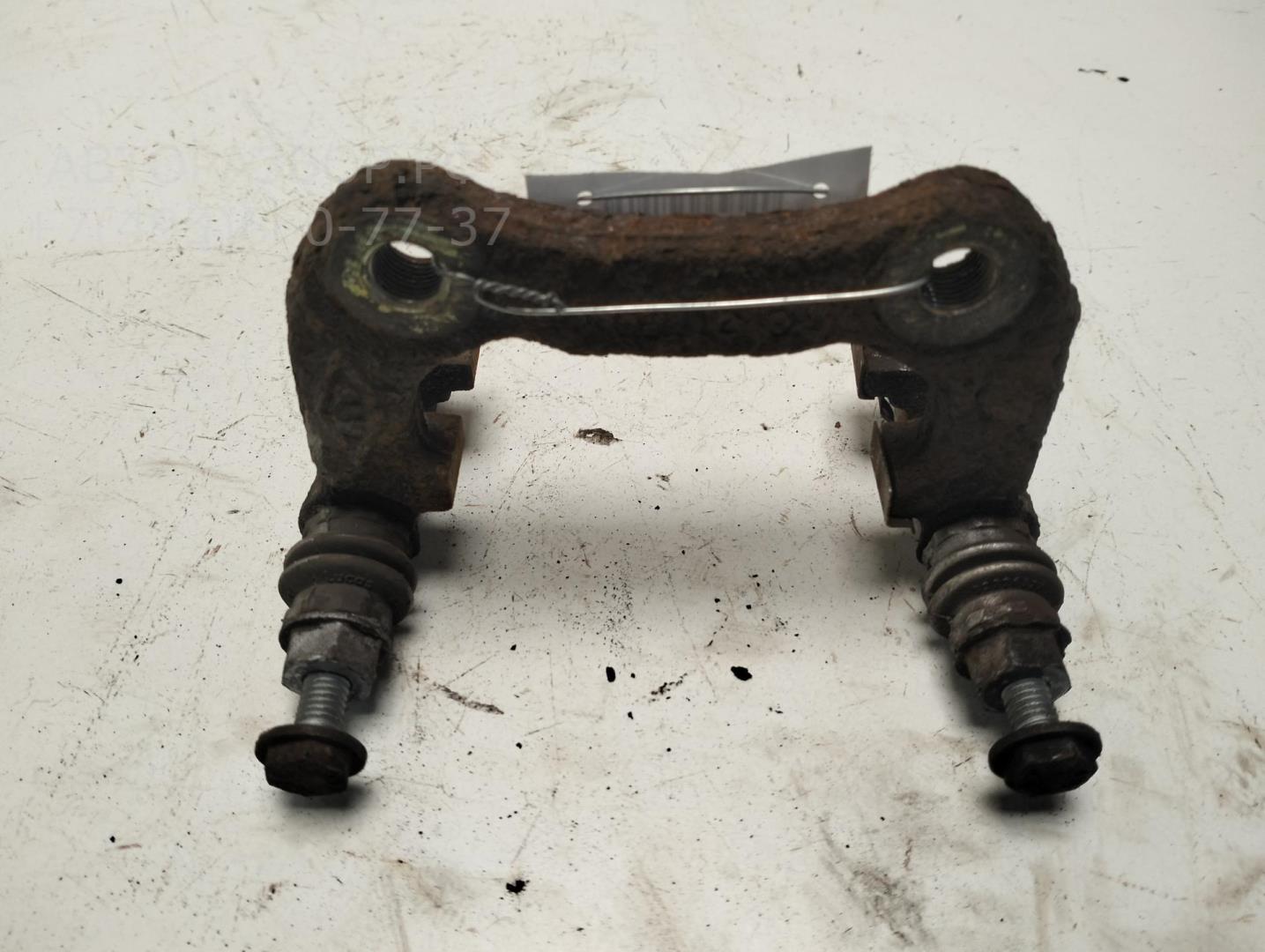 Скоба суппорта заднего