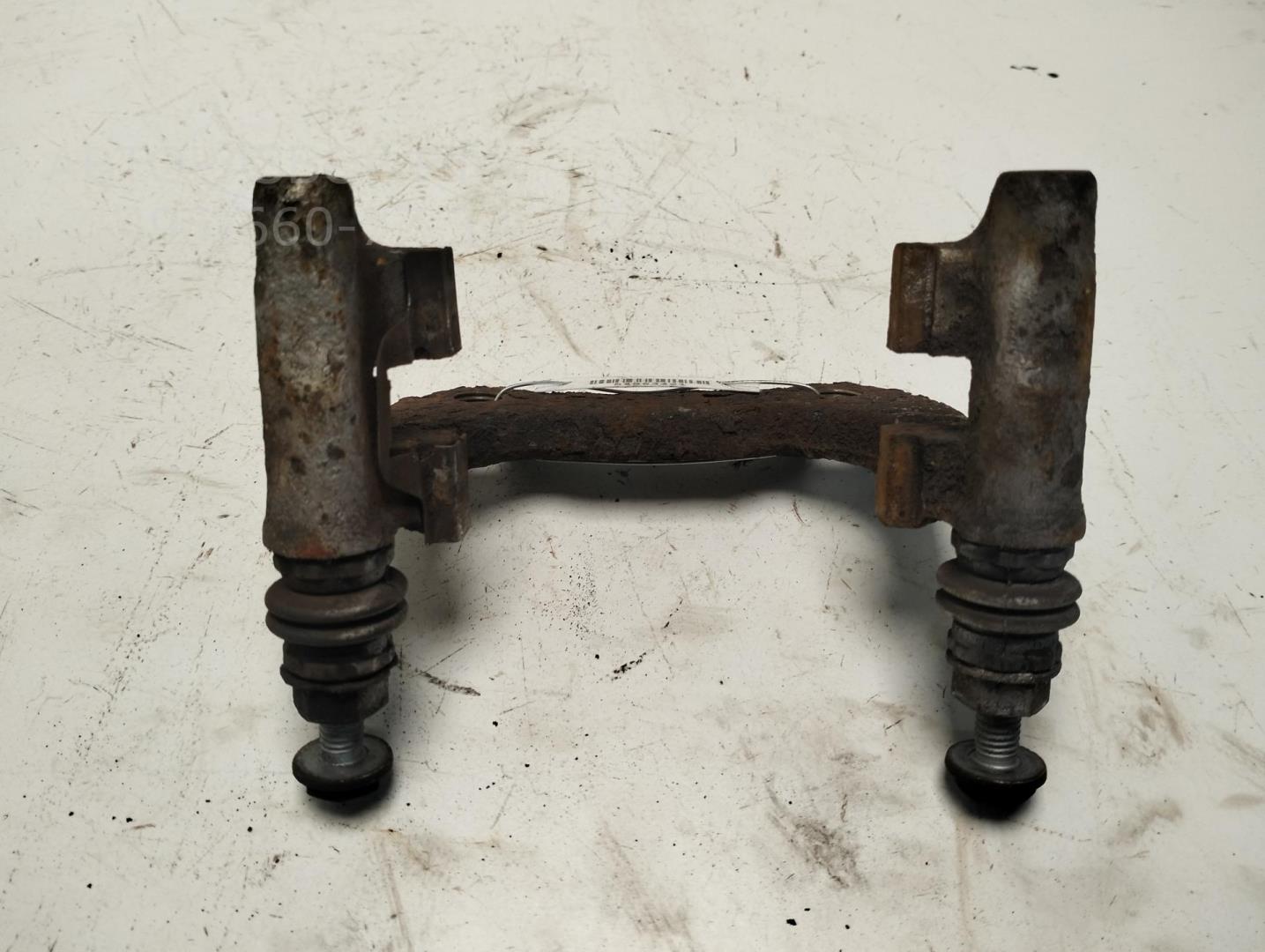 Скоба суппорта заднего