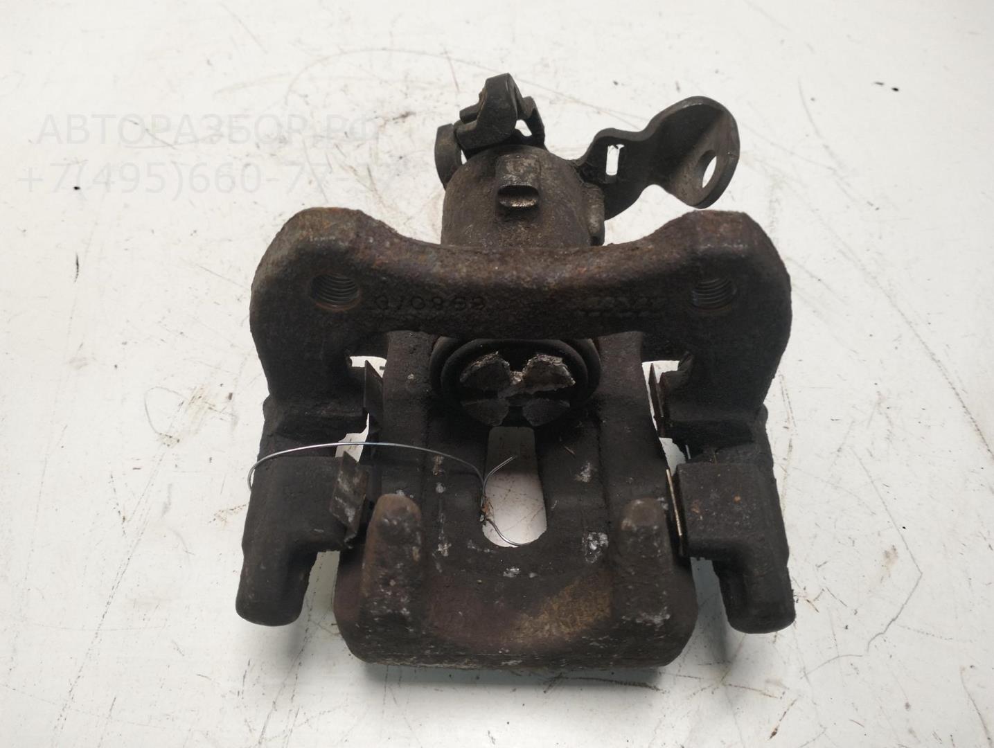 Суппорт задний левый