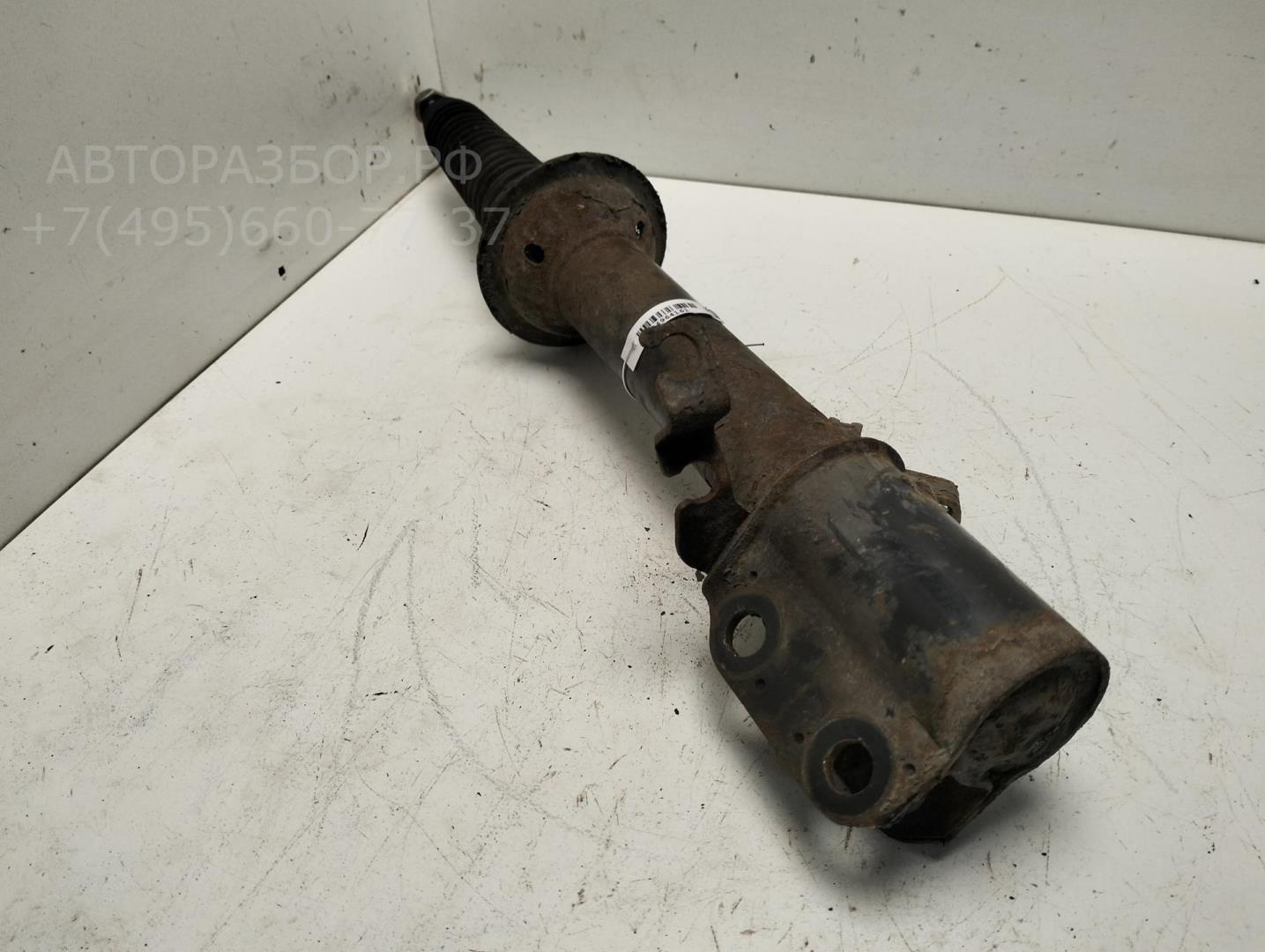 Амортизатор передний левый