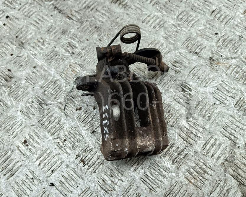 Суппорт задний левый