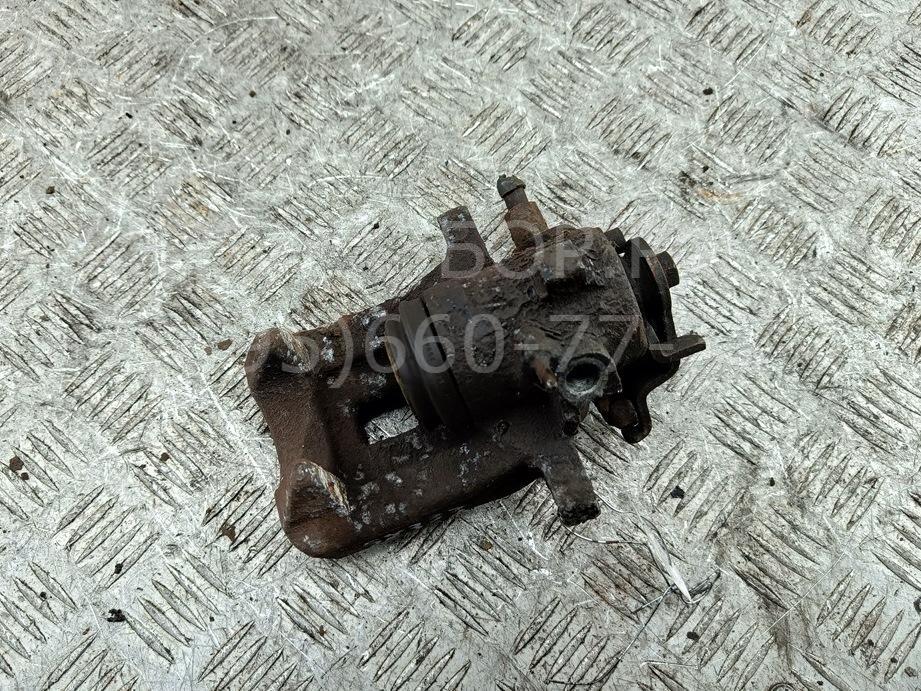 Суппорт задний левый