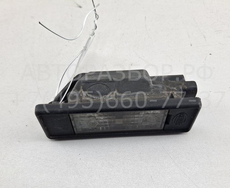 Фонарь подсветки номера