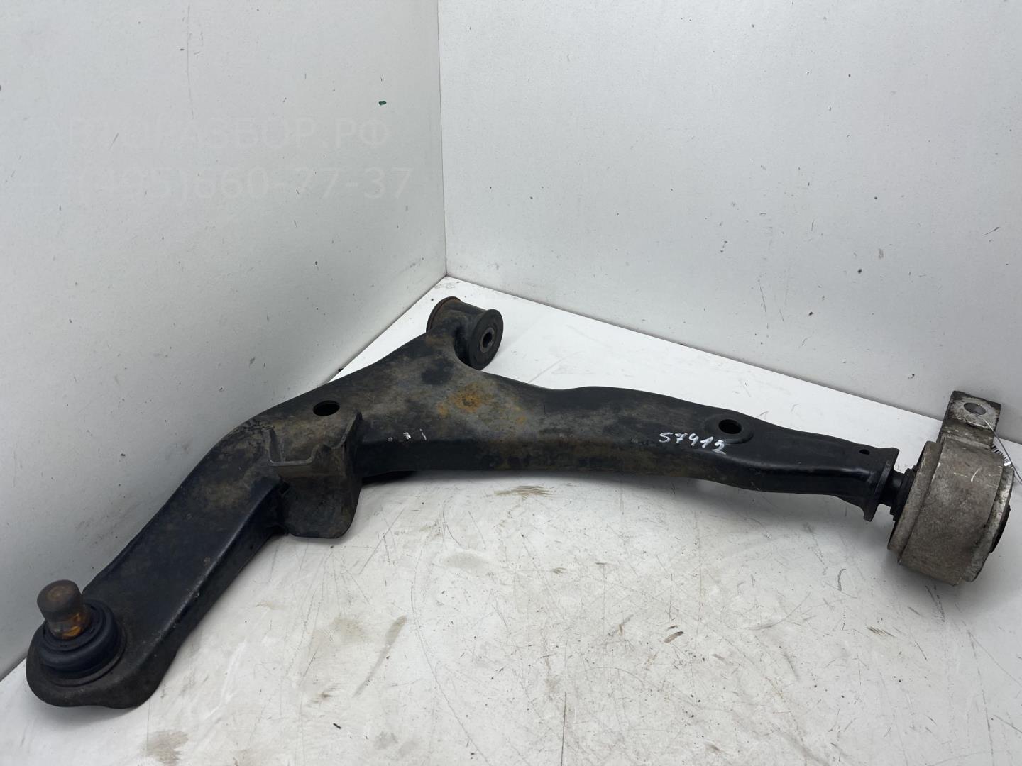 Рычаг передний левый